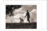 Hunter Walking with Bird Dog by Anonymous