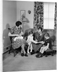 Family Sitting in Living Room by Anonymous