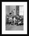 Family Sitting in Living Room by Anonymous