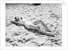 Woman Lying on the Beach by Anonymous