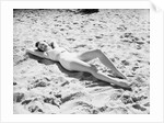 Woman Lying on the Beach by Anonymous