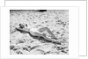 Woman Lying on the Beach by Anonymous