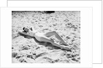 Woman Lying on the Beach by Anonymous