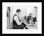 Tailor Working at Sewing Machine by Anonymous