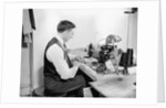 Tailor Working at Sewing Machine by Anonymous