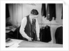 Tailor Cutting Fabric by Anonymous