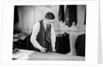 Tailor Cutting Fabric by Anonymous