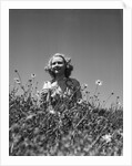 Woman in Wildflower Field by Anonymous