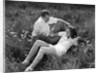 Couple Lying in Field by Anonymous