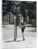 Child Reaching into Mailbox by Anonymous