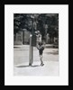 Child Reaching into Mailbox by Anonymous