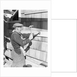 Carpenter Hammering by Anonymous