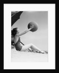 Young Woman Playing With Beach Ball by Anonymous