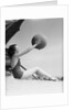 Young Woman Playing With Beach Ball by Anonymous