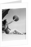Young Woman Playing With Beach Ball by Anonymous