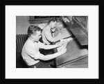 Men At Desks Proofreading Documents by Anonymous