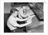 Men At Desks Proofreading Documents by Anonymous