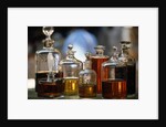 Display Of Perfume Bottles In Market by Anonymous