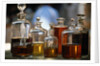 Display Of Perfume Bottles In Market by Anonymous