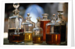 Display Of Perfume Bottles In Market by Anonymous