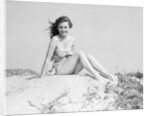 Young Woman Seated on Sand Dune by Anonymous