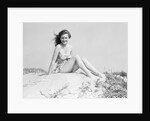 Young Woman Seated on Sand Dune by Anonymous