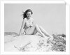 Young Woman Seated on Sand Dune by Anonymous