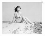 Young Woman Seated on Sand Dune by Anonymous