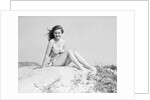 Young Woman Seated on Sand Dune by Anonymous