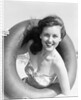 Woman with Head Through Inner Tube by Anonymous
