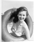 Woman with Head Through Inner Tube by Anonymous
