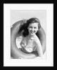 Woman with Head Through Inner Tube by Anonymous