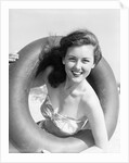 Woman with Head Through Inner Tube by Anonymous