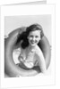 Woman with Head Through Inner Tube by Anonymous