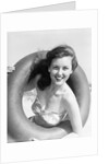 Woman with Head Through Inner Tube by Anonymous