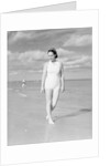 Woman Casually Strolling Along the Beach by Anonymous