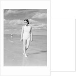 Woman Casually Strolling Along the Beach by Anonymous