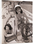 Women at the Helm of Sailboat by Anonymous