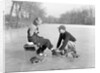 Man Lacing a Woman's Ice Skate by Anonymous