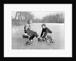 Man Lacing a Woman's Ice Skate by Anonymous