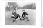 Man Lacing a Woman's Ice Skate by Anonymous