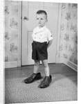 Boy Wearing Men's Shoes by Anonymous
