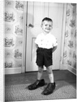 Boy Wearing Men's Shoes by Anonymous