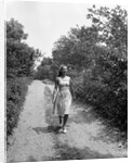 Woman Walking on Country Road by Anonymous