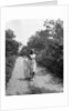 Woman Walking on Country Road by Anonymous