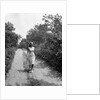 Woman Walking on Country Road by Anonymous
