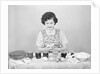 Woman Coloring Easter Eggs by Anonymous
