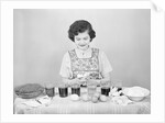 Woman Coloring Easter Eggs by Anonymous