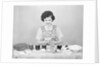 Woman Coloring Easter Eggs by Anonymous