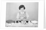 Woman Coloring Easter Eggs by Anonymous
